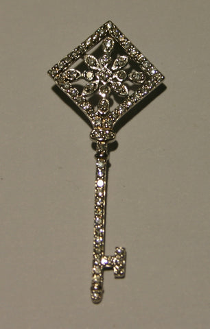 white gold and diamond key pendant
