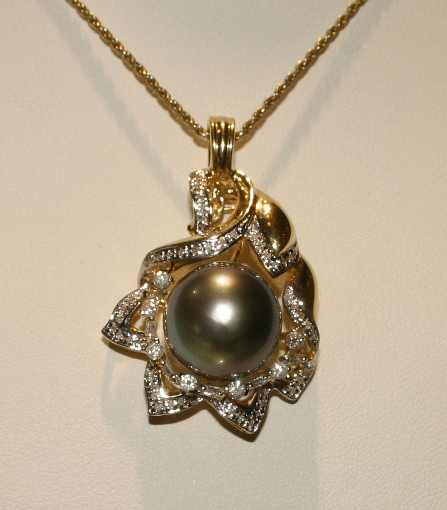 yellow gold and floral pearl pendant